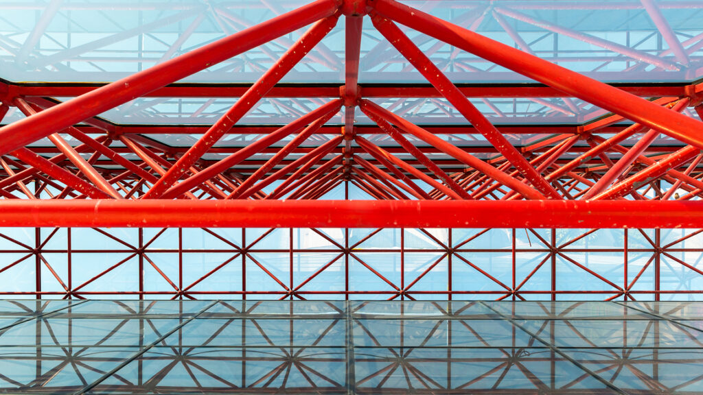 The urban abstract red steel structure of the office building